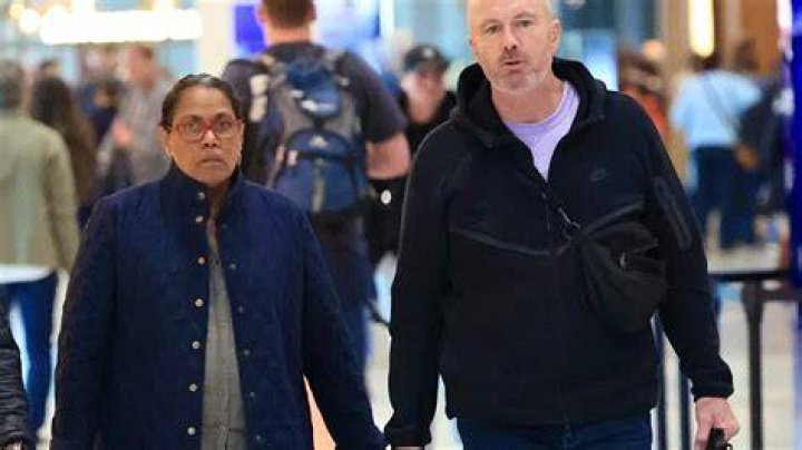 Freeman is seen with partner Lori McCreary at Denzel Washington
