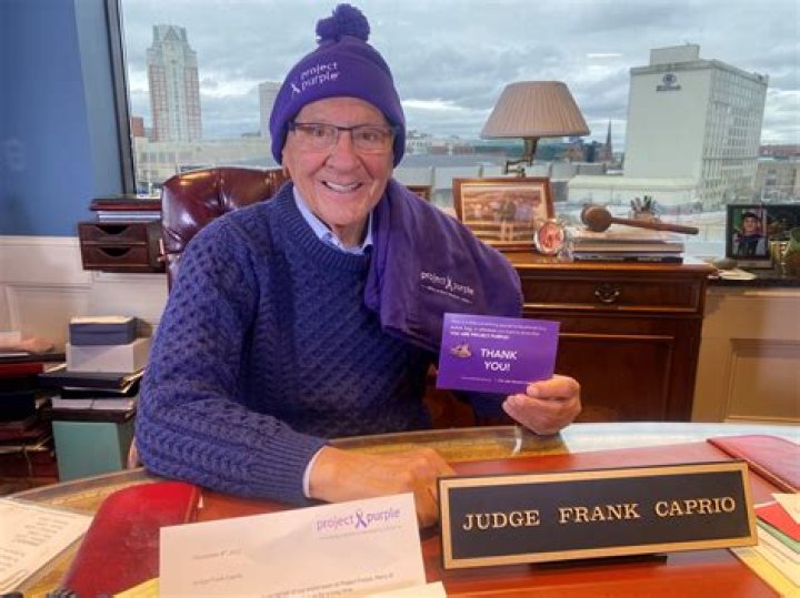 Judge Frank Caprio Receives Project Purple Blanket of Hope to Help With