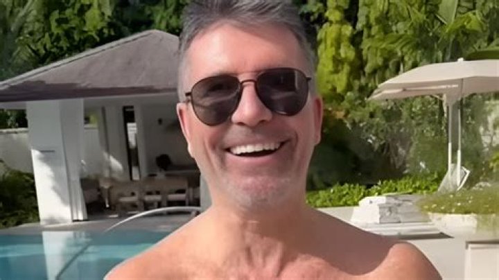 Simon Cowell shows off his toned physique as he goes on a jet ski with