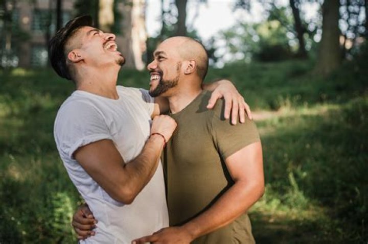 Two Men Hugging · Free Stock Photo